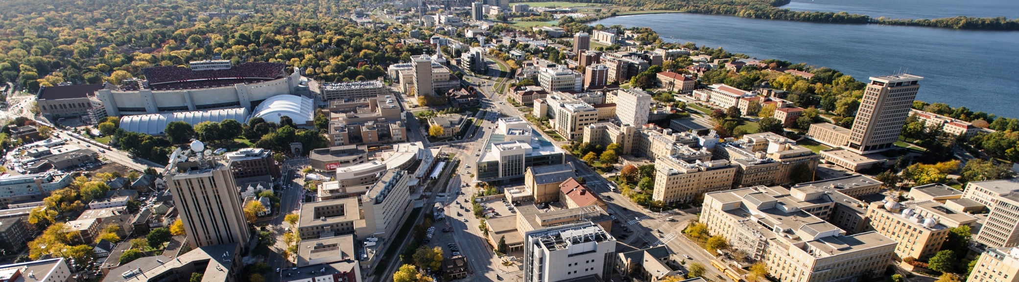 An aerial view of the Atmospheric and Oceanic Sciences department with Camp Randall and West Madison in the background.