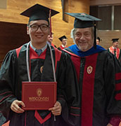Photo of Peidong Wang and Prof. Greg Tripoli